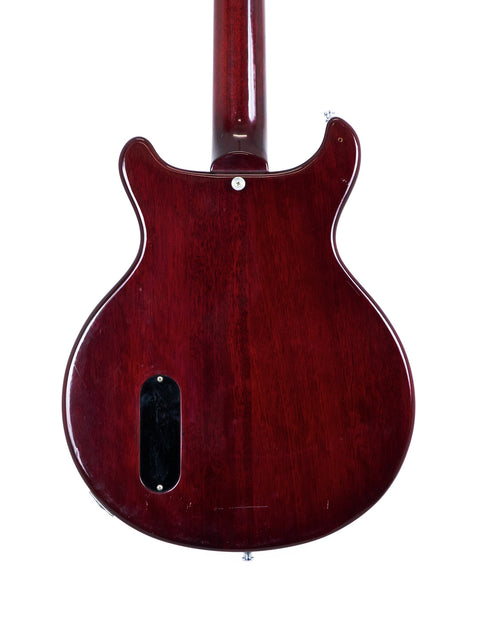 Vintage 1980s Burny Les Paul Jr guitar in red, showcasing a stylish black pickguard, ideal for rock music lovers.
