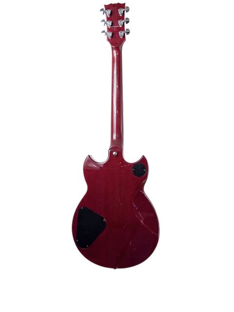 Vintage 1981 Yamaha SG 800S electric guitar in red with a stylish black pickguard.
