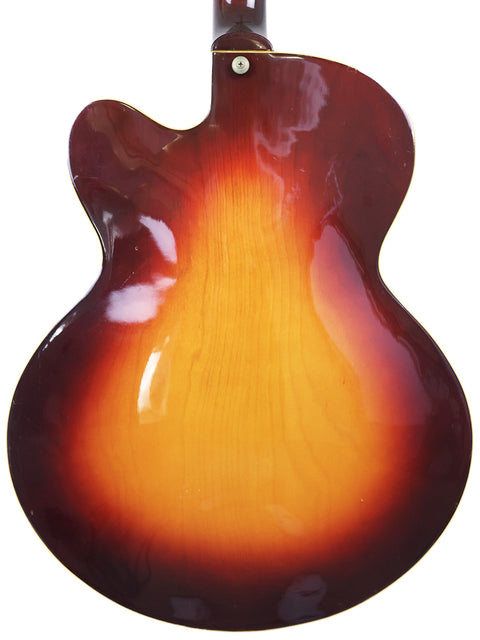 Vintage 1982 Yamaha AE1200 guitar in sunburst finish with a stylish black pick guard, perfect for music enthusiasts.