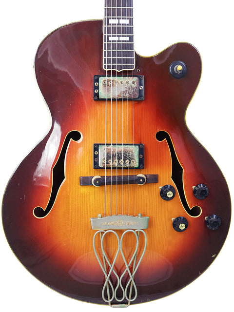 Vintage 1982 Yamaha AE1200 guitar showcasing a vibrant sunburst finish paired with a stylish black pickguard.
