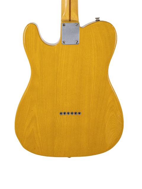 Vintage 1984 Fender Squier JV Telecaster guitar featuring a yellow finish with a white body and neck.