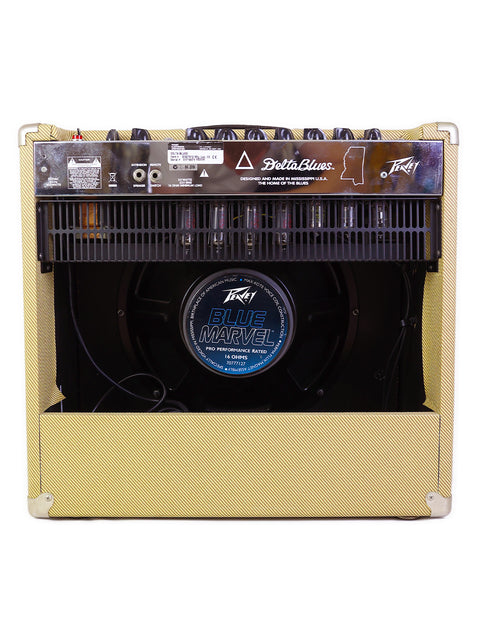 Vintage 2008 Peavey Delta Blues 115 guitar amplifier in yellow, featuring a stylish black cover for protection.