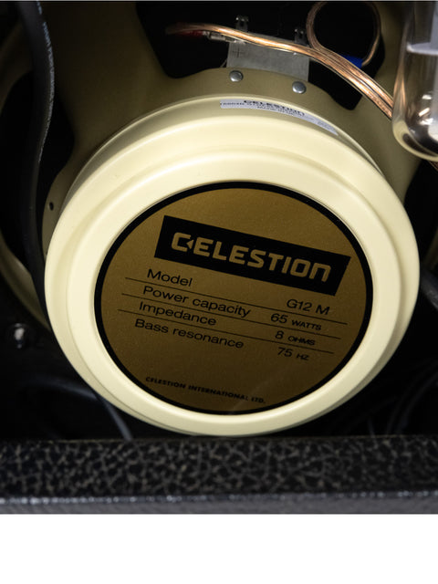  Vintage Celestion C-1 speaker alongside a 1987 Mesa Boogie Mark III amplifier, highlighting classic music gear.
