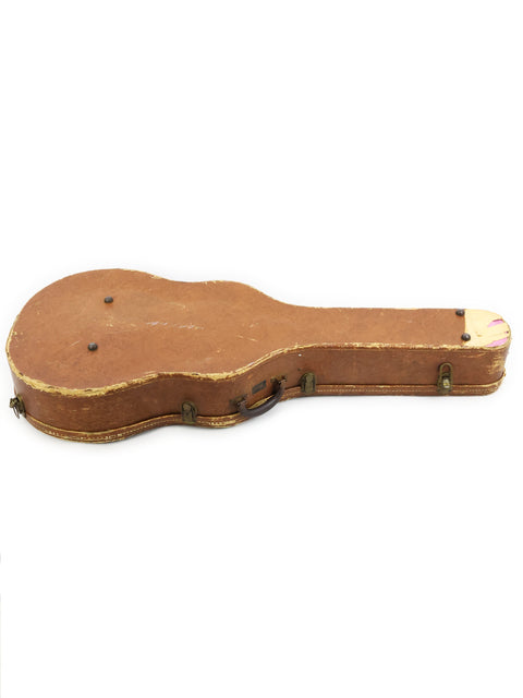 Vintage Gibson J-200 guitar case from 1954, featuring a beautifully crafted wooden top.