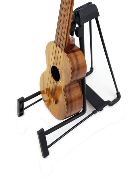  Vintage Royal Style 3 Koa Ukulele, Hawaii c. 1916, displayed on a stand.
