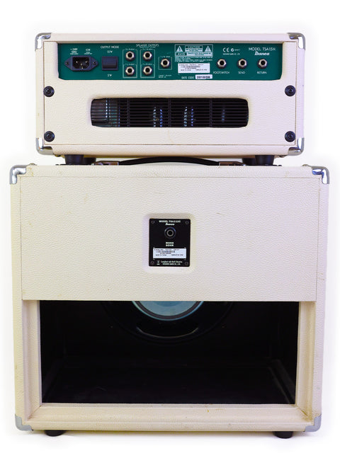 White Ibanez TSA15 amplifier featuring a green cover, part of the 2010 model with a 15W head and 80W cabinet.