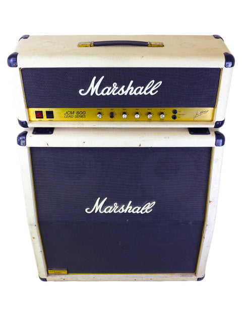 White and black Marshall JCM800 2204 amp head with a 4x12 quad cabinet, a classic from the UK, 1984.