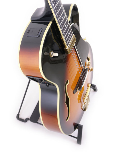 Yamaha AEX1500 guitar in black, poised on a stand, representing fine Japanese craftsmanship from 2004.