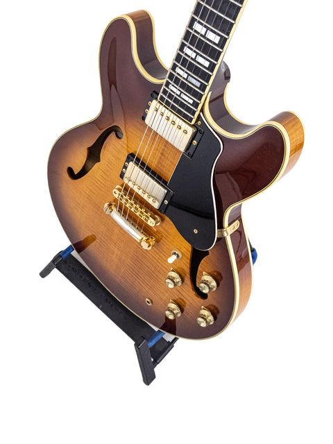 Yamaha SA 2200 Thinline guitar featuring a black body and brown neck, a stylish instrument from Japan, made in 2004.
