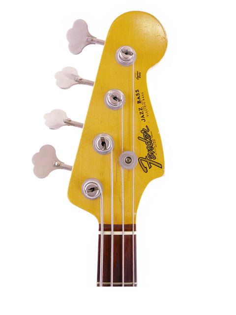  Yellow Fender Custom Shop '64 Jazz Bass Relic from 2006, showcasing its vintage design and craftsmanship.