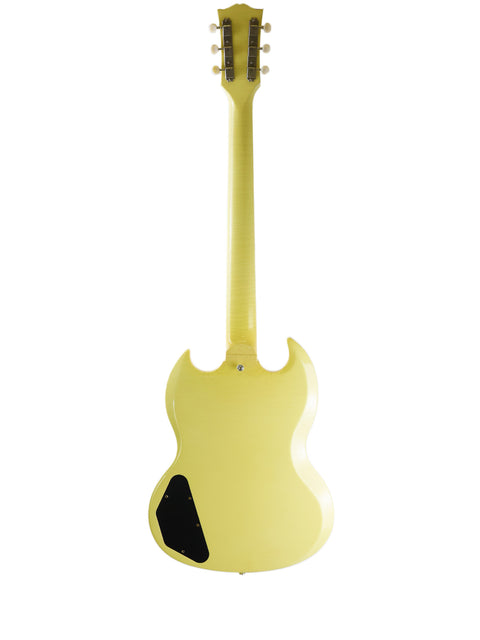 Yellow Gibson Custom ‘63 SG Special guitar featuring a black pickguard, highlighting its classic style and craftsmanship.
