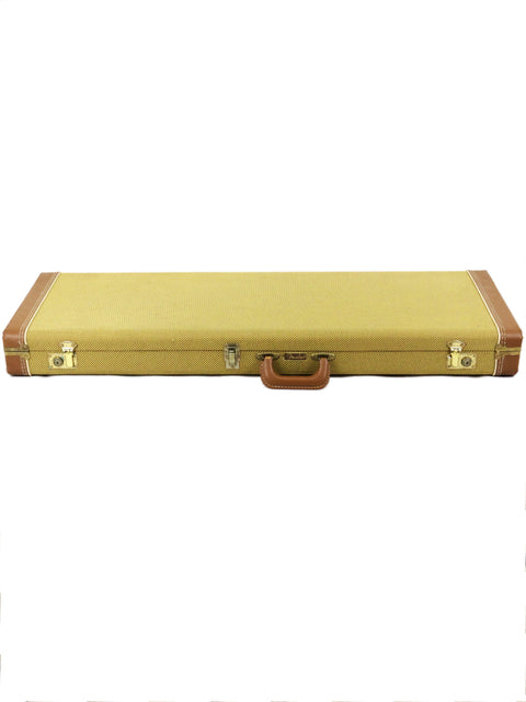 Yellow and brown hard guitar case with metal clasps, isolated on a white background.