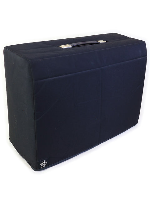 Zippered black cover for a 1967 Fender Deluxe Reverb 22 Watt Combo Amplifier, highlighting its vintage aesthetic.