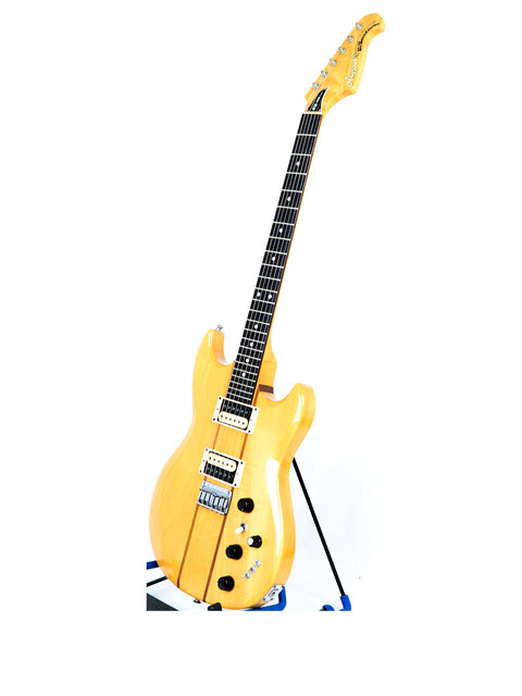  striking yellow electric guitar displayed on a stand, representing the Aria Pro II TS 400 Tri Sound Series, Japan 1980.
