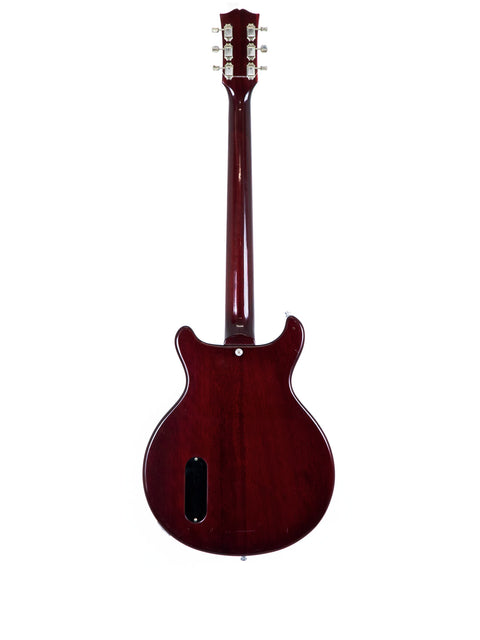 vibrant red Burny Les Paul Jr guitar from the 1980s, set against a clean white background, showcasing its classic design.