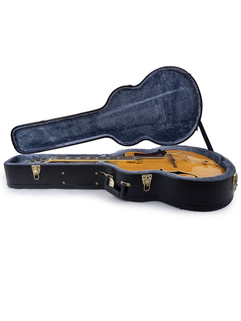 vintage Epiphone Coronet guitar case, showcasing a classic design for a 1965 USA guitar.