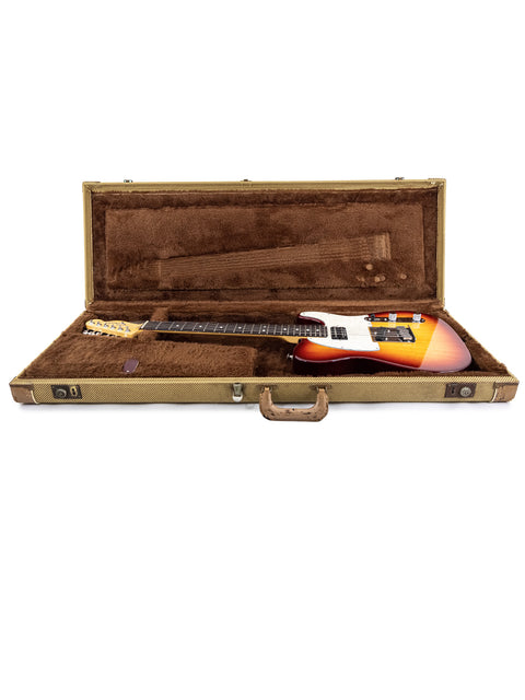 white background highlights a Fender American Standard Telecaster guitar in its case, emphasizing its classic style.
